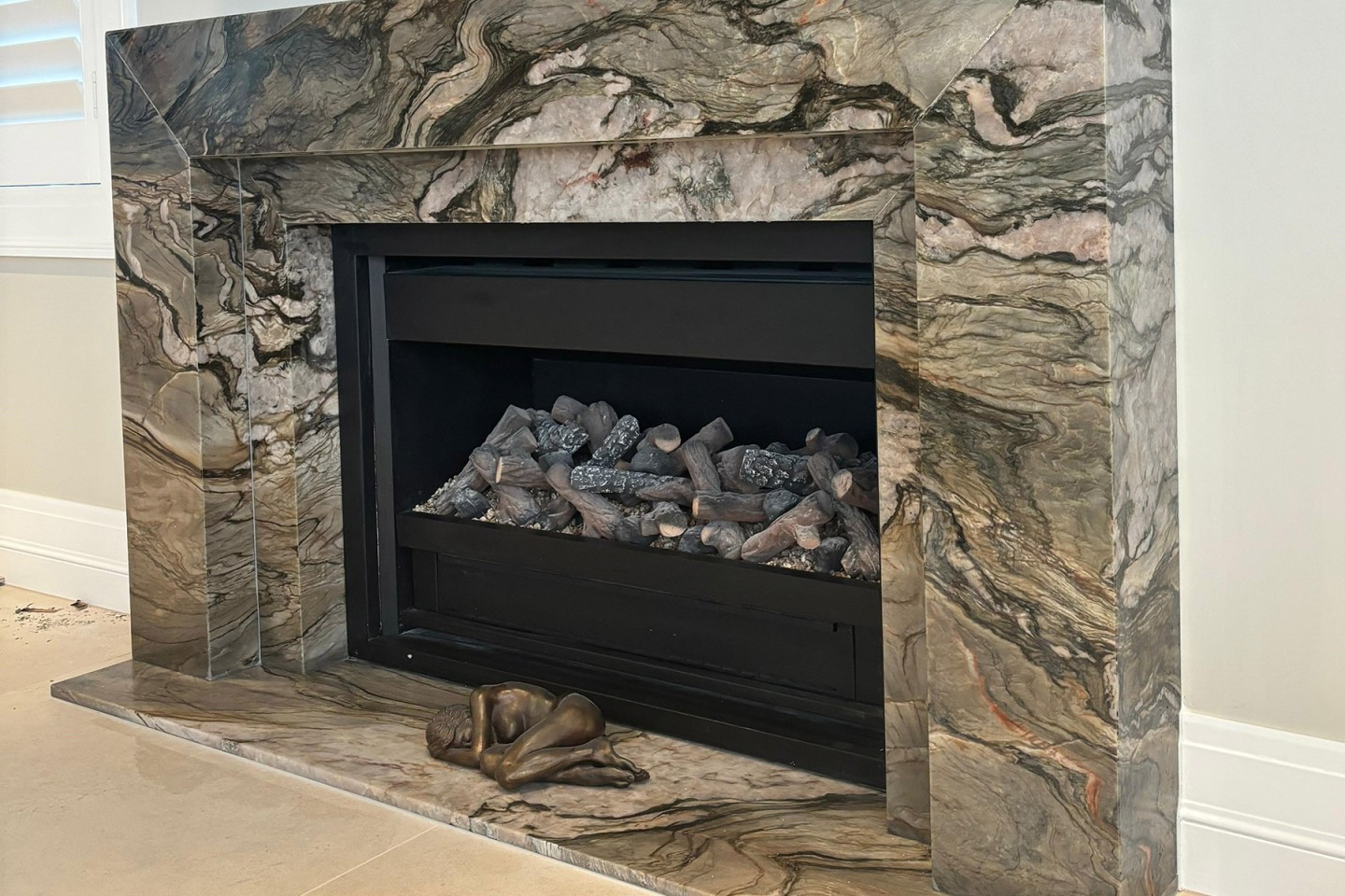 Blue Tempest quartzite fire surround hearth