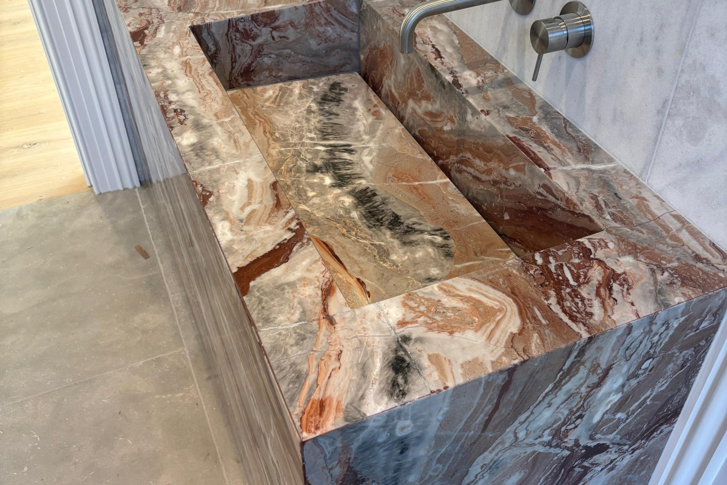 Custom marble integrated bathroom vanity