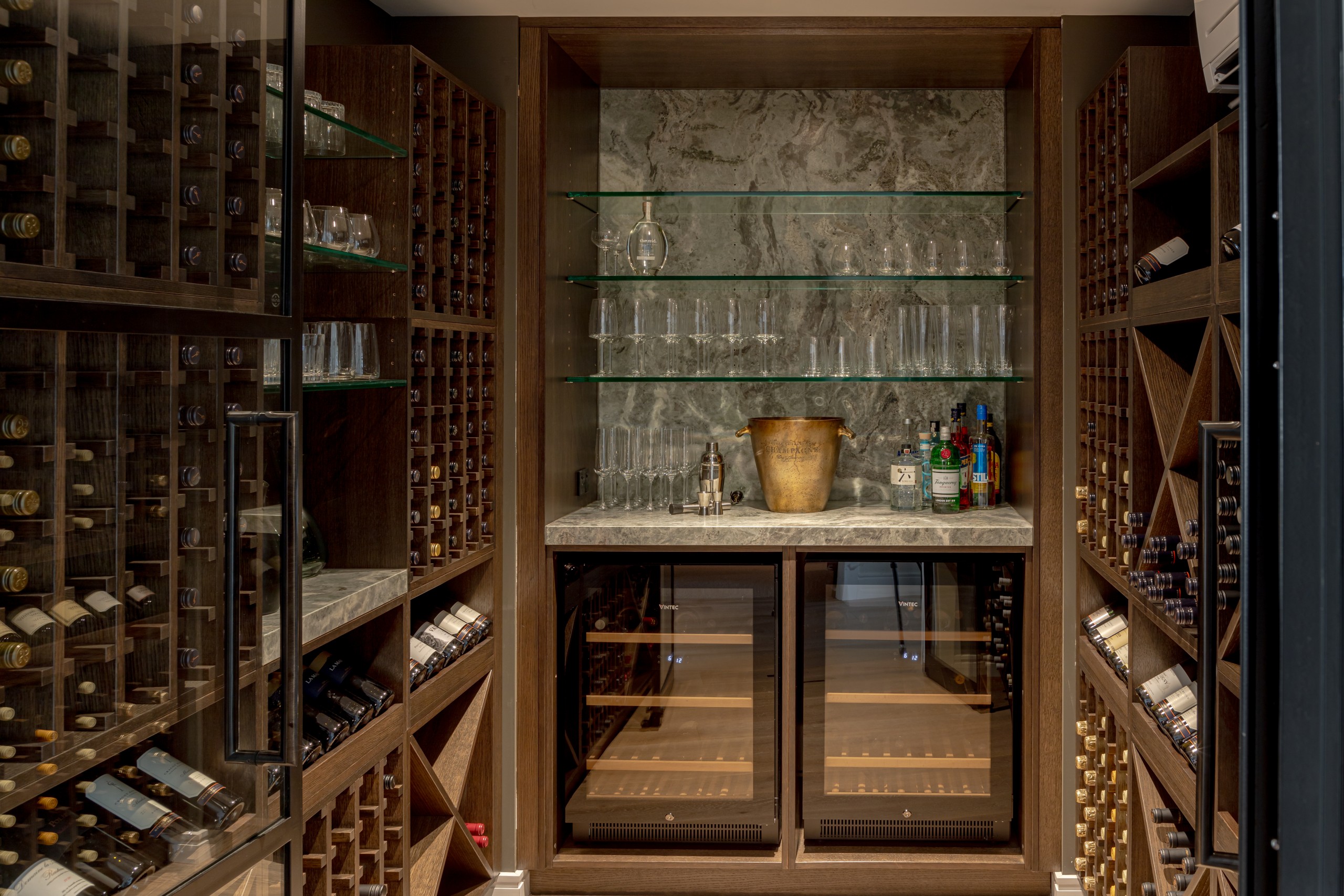 Fantasy white Granite wall feature and benchtops. Wine Cellar. Millbrook Queenstown