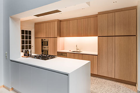 SupremeWhite Diamondstone kitchen with oak cabinetry