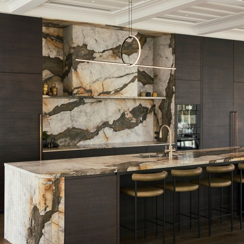 Montenegro marble kitchen island with curved fluted waterfall end and bullnose edge detailing