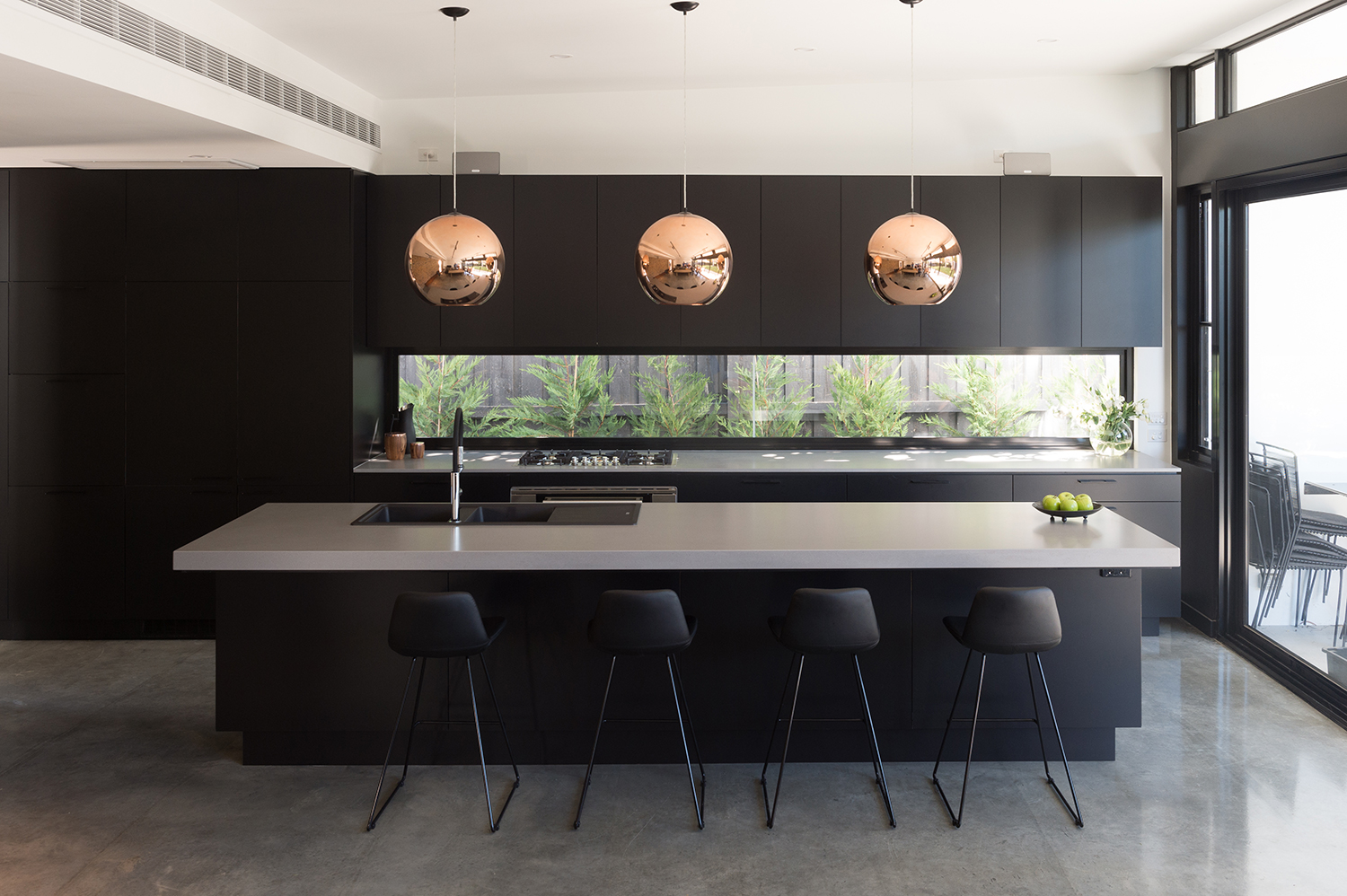raw concrete caesarstone kitchen
