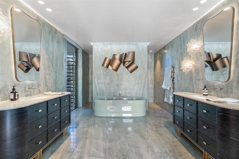 Mystique Green quartzite walls floors shower bathroom vanity tops