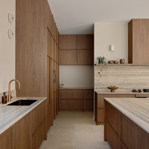 Silver travertine benchtops and splashback
